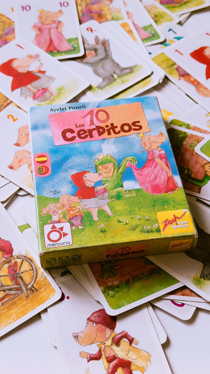 Los 10 Cerditos – Sumas hasta 10, decisiones rápidas y un montón que nadie quiere regalar  6+ años · 2-8 jugadores · 15-20 minutos · Mercurio