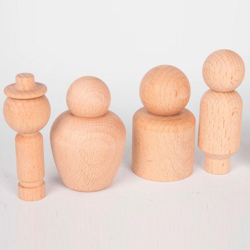 10 figuras de madera de miembros de la comunidad Tickit
